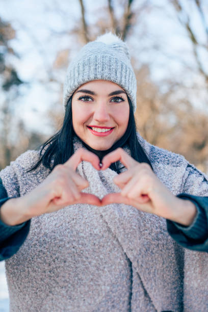 istock Girl Making Heart Shape With Hands 1343916996