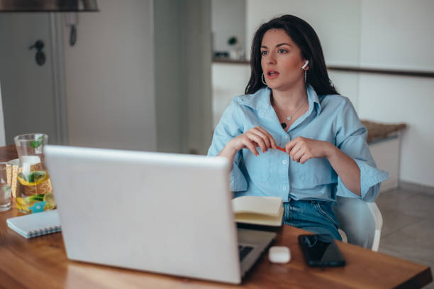 istock Young beautiful businesswoman in her office using a laptop 1343926251