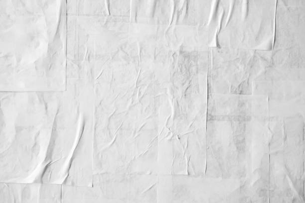 istock Blank white crumpled and creased paper poster texture 1343933460