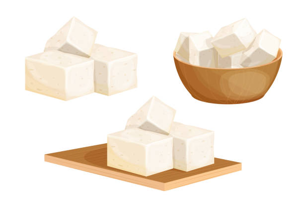 set tofu-stücke in holzschüssel, auf schneidepult im cartoon-stil isoliert auf weißem hintergrund. vegetarische ernährungszutat, gesundes essen. kalter tofu in der tasse. traditionelle küche. vektor-illustration - quark stock-grafiken, -clipart, -cartoons und -symbole