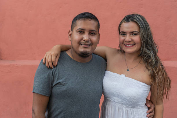 istock couple having fun outside and smiling. 1343937397