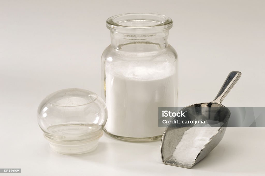 Sodium bicarbonate. Sodium bicarbonate in a pharmaceutical glass jar. White background. Abdomen Stock Photo