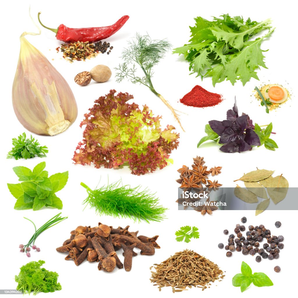 Spice and Herb Set A large set of spices & herbs – garlic, chili pepper, nutmegs, dill, mizuna, lettuce, parsley, tandoori masala, soup seasoning, basil, mint, fennel, anise, bay leaves, chives, cloves, celery, juniper berries and caraway seeds isolated on a white background Anise Stock Photo