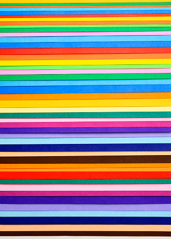 Overhead shot of abstract multi colored paper background.