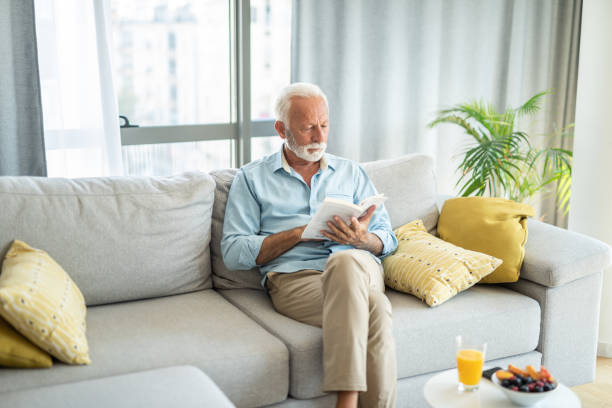 istock Senior man relaxing at home on sofa. 1343960962