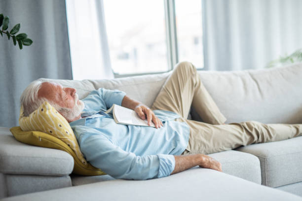 istock Senior man having a good nap at home. 1343962800