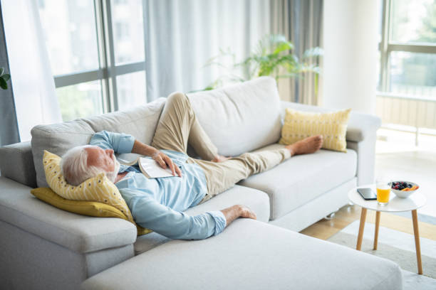 istock Senior man having a good nap at home. 1343962819