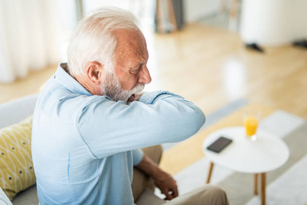 istock Senior man coughing. 1343962852
