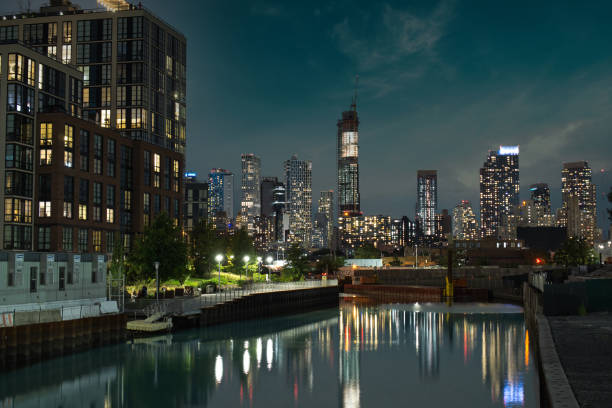 istock Skyscraper, towers in Downtown Brooklyn seen from Gowanus Canal during sunset 1343964660