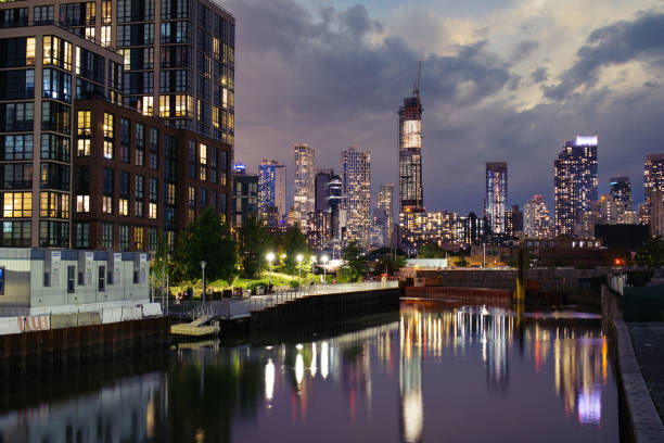 Skyscraper, towers in Downtown Brooklyn seen from Gowanus Canal during sunset