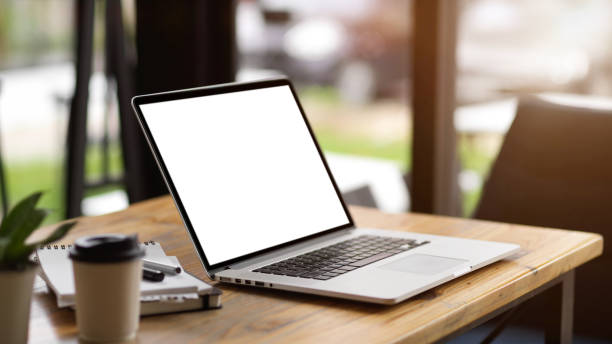 istock Modern office with digital laptop computer in blank screen mockup 1343965649