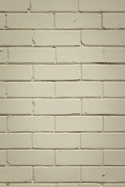 istock Part of a light green painted brick wall 1343971710