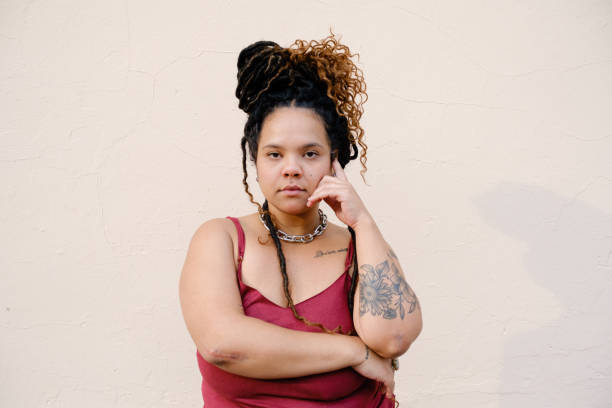 istock Young african-descent woman with dreadlocks looking at camera. 1343974362