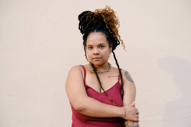 istock Young african-descent woman with dreadlocks looking at camera. 1343974372