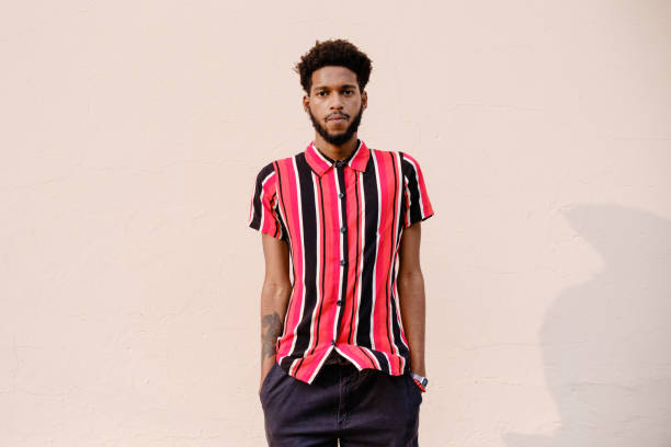 Man shirts put on white wooden table top background