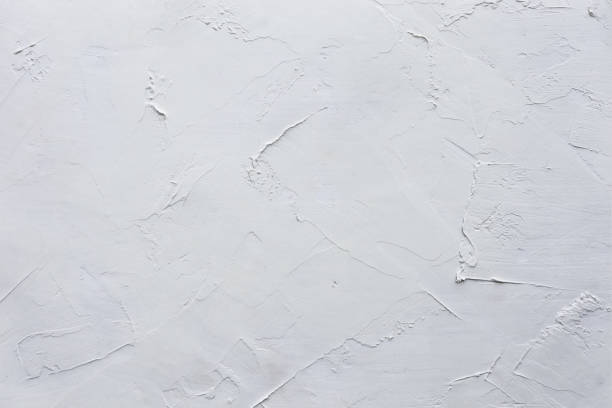 istock White wall texture rough background abstract concrete floor for design,The grunge white concrete old texture wall. 1343986839