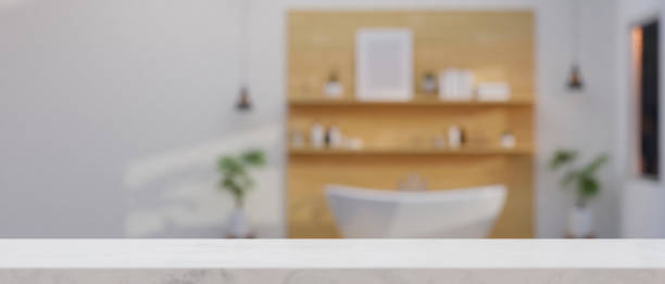 istock Empty tabletop for product display montage with blurred Modern Scandinavian bathroom interior 1343997317