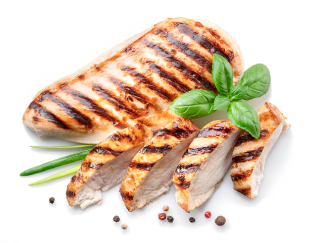 istock Grilled chicken fillet with herbs isolated on white background. 1344001219
