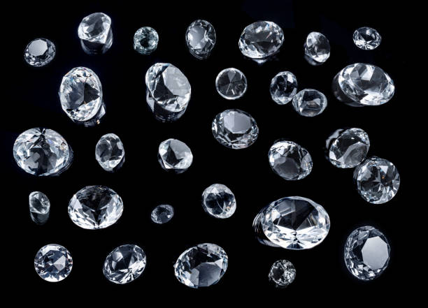 istock Large gemstones and small gemstones isolated on black background. 1344003542