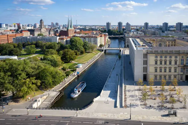 panoramic view from cathedral on berlin cityscape with spree river and city palace at blue summer day