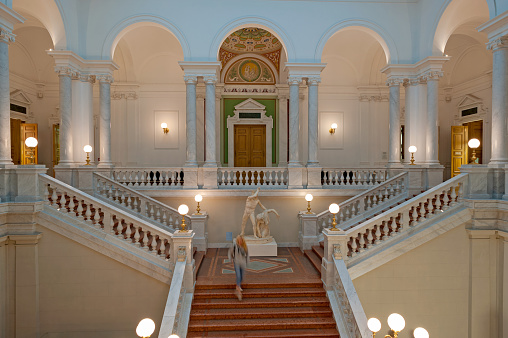 The Palace of the Parliament is the seat of the Parliament of Romania. The Palace of the Parliament is one of the heaviest buildings in the world, constructed over a period of 13 years (1984–1997). The image shows a huge staircase inside the Parliament Building.