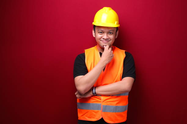 istock Thinking Young asian man worker is seriously think gesture on red background 1344010324