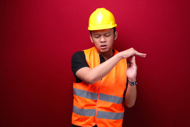 istock Tired and stress young asian man worker with tired hand gesture 1344010558