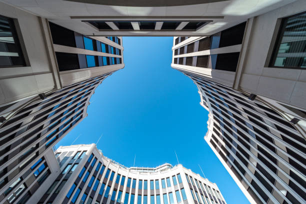istock Low Angle View Of Modern Buildings Against Clear Blue Sky 1344012178