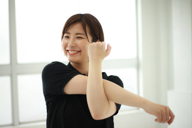 istock Image of a sports trainer that stretches 1344012255