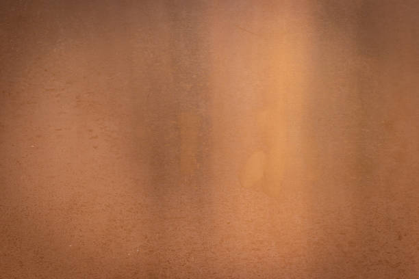 istock Metallic copper background image. (oblique gradient) The light reflected on the old foil. 1344013094