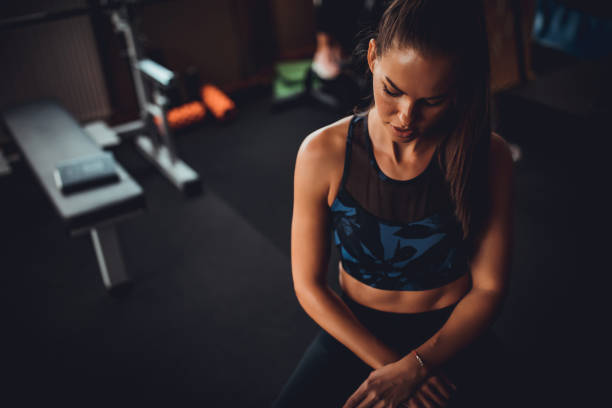 istock Beautiful woman in gym 1344016509