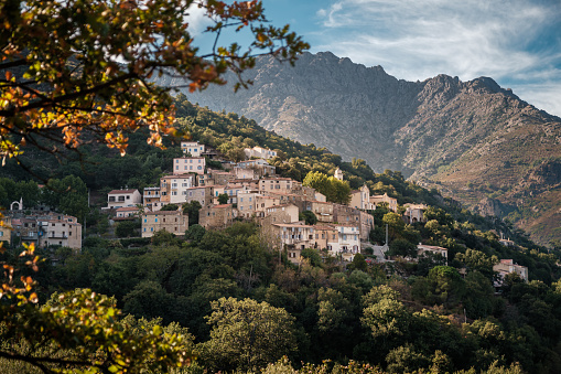 The village of Nessa in the Balagne region of Corsica with mountains behind