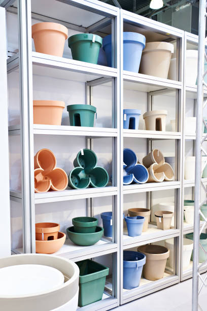 Plastic pots and planters for home plants in store