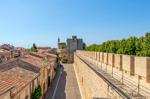 Aigues-Mortes, France - July, 2021 : Ramparts of Aigues-Mortes, well preserved medieval city walls surrounding the city in the Gard department in the Occitanie region of southern France