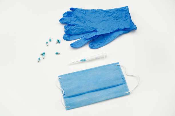 istock Medicine, mask and disposable gloves on a white background 1344021829