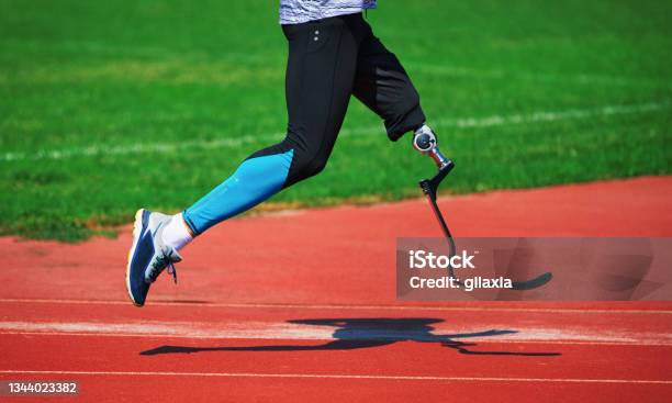 Man With Prosthetic Leg Running Stock Photo - Download Image Now - Artificial Sports Foot, Running, Athlete with Disabilities