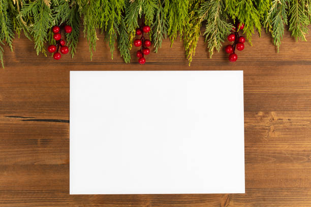 istock Christmas decorations with empty card on white background. christmas background with space for writing. 1344025745