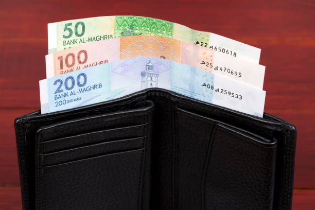 moroccan money in the black wallet - moroccan currency fotos imagens e fotografias de stock