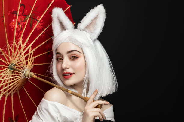 girl in white wig and carnival costume, cosplay cat woman. - cosplay imagens e fotografias de stock