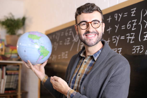 Cute geographer showing the world.