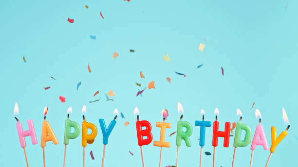 istock Colored confetti falling with happy birthday inscription on pastel blue background 1344031712