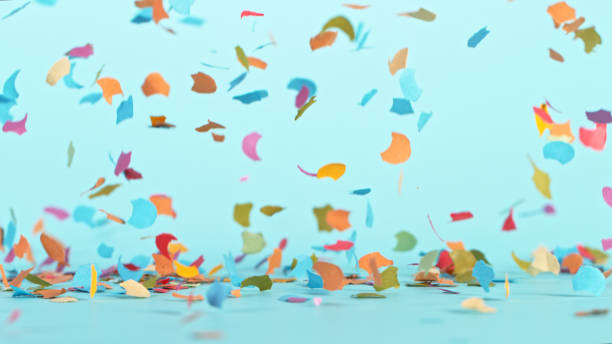 istock Color confetti falling on pastel blue background 1344031855