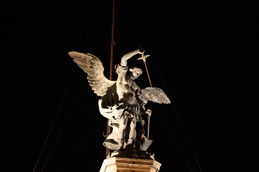 portrait photo of the Archangel Michael at night