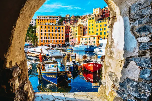 Camogli port village cityscape with colored houses and boats, Liguria, Italy