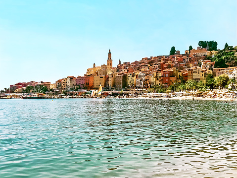 Menton beach coast with clear water and colored houses, cote d'azur, France