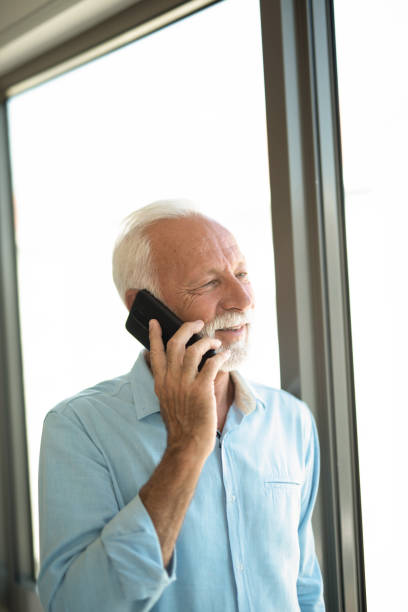 istock Senior businessman talking on phone. 1344036736
