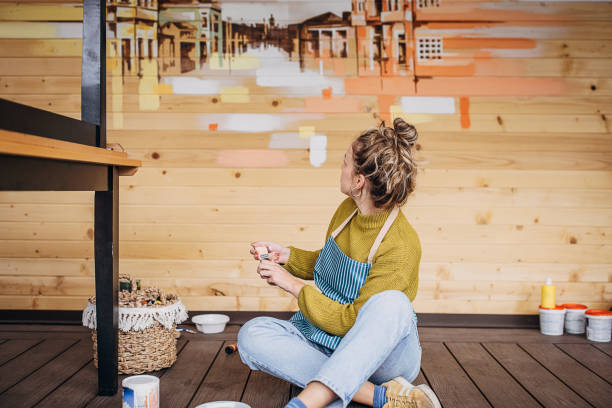istock Female painter mixing colors 1344037087