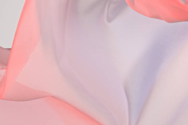 istock Smooth elegant colorful transparent cloth separated on white background. 1344038114