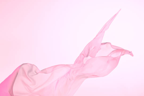 istock Smooth elegant colorful transparent cloth separated on white background. 1344038284