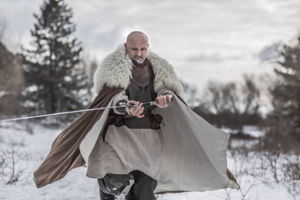 istock Viking warrior king in a snowy forest 1344043489